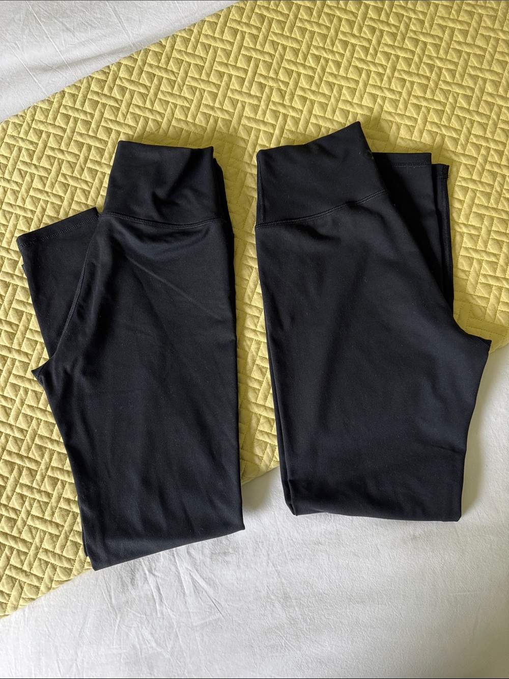 2 pairs black Country Road leggings.